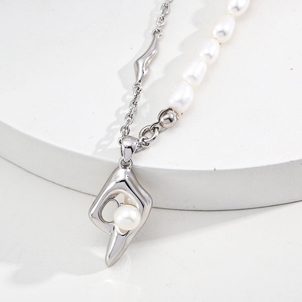 Sterling Silver Pearl Necklace with Irregular Three-Dimensional Geometric Pendant